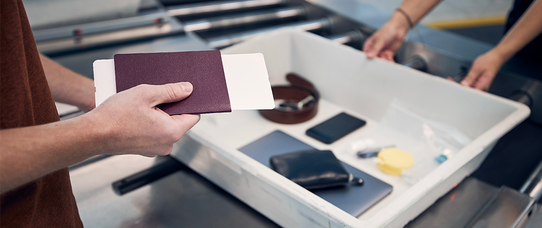 An image of passport control with travel supplies.